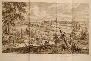 Offenes Buch mit der Aufschrift 'Ansicht der Schlacht von Castellum und Castellium aus der Illustrated London News', das eine Landschaft mit Menschen, Bäumen, Pflanzen, Gebäuden und Wolken zeigt.