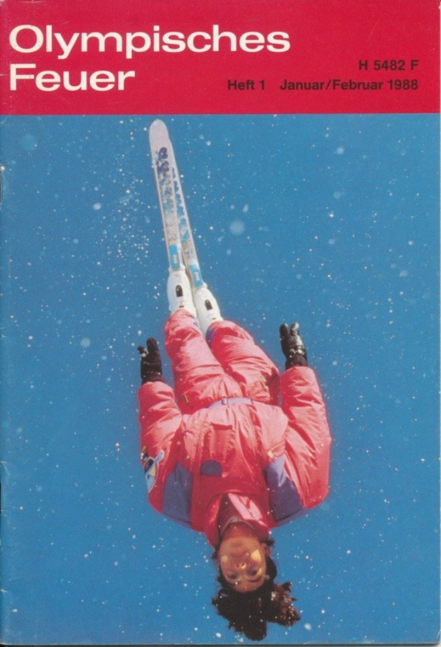 Titelbild "Olympische Spiele Feuer - Heft 1 - Januar/Februar 1988" mit einem Skifahrer in der Luft in einem Ski-Anzug.