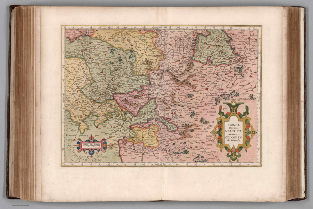 Offenes Buch mit detaillierter Karte Deutschlands und begleitendem Text.