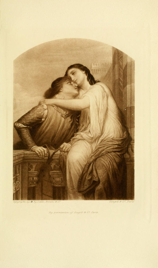 Zwei Personen auf einer Bank sitzend, die sich umarmen und küssen, mit Text unten.